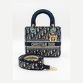 Dior Lady D-Lite bag in the mini size with blue Dior Oblique jacquard embroidery