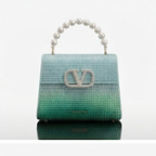 Valentino Garavani Mini VSling handbag entirely covered in rhinestones