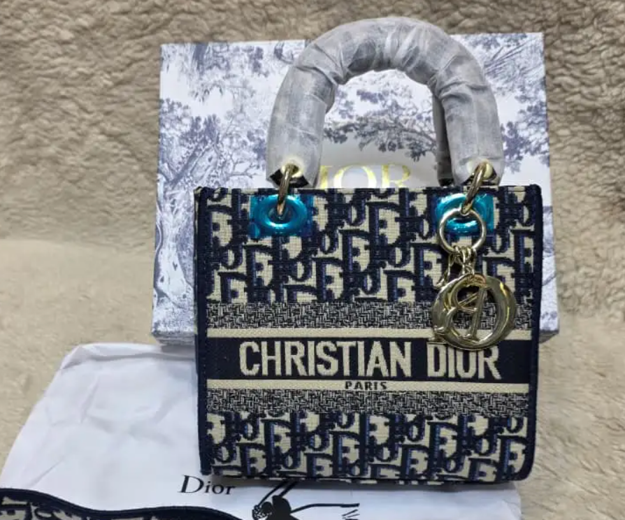 Dior Lady D-Lite bag in the mini size with blue Dior Oblique jacquard embroidery