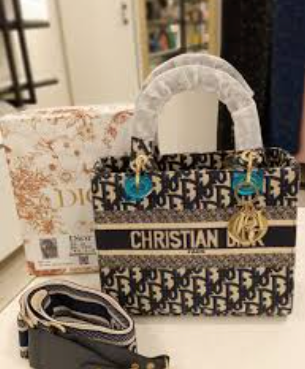 Dior Lady D-Lite bag in the mini size with blue Dior Oblique jacquard embroidery