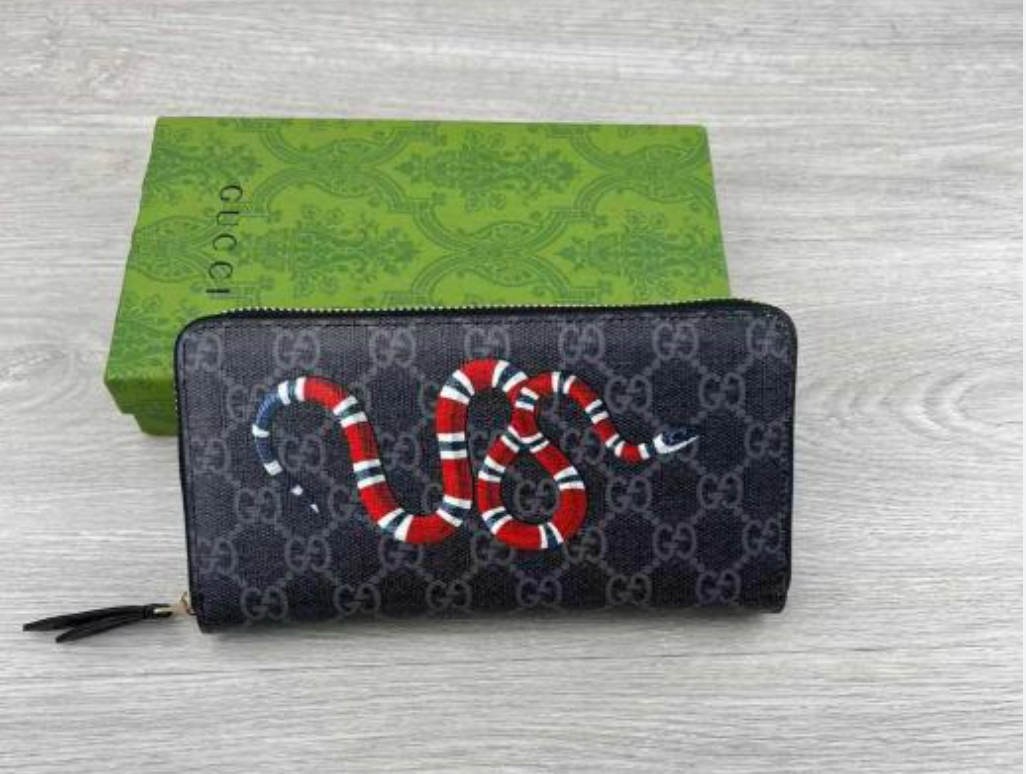Gucci Kingsnake Print GG Supreme zip-around long wallet in Navy Blue