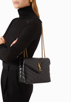 Saint Laurent Loulou medium shoulder bag in black matelassé leather.
