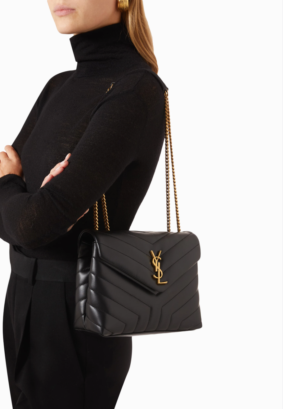 Saint Laurent Loulou medium shoulder bag in black matelassé leather.