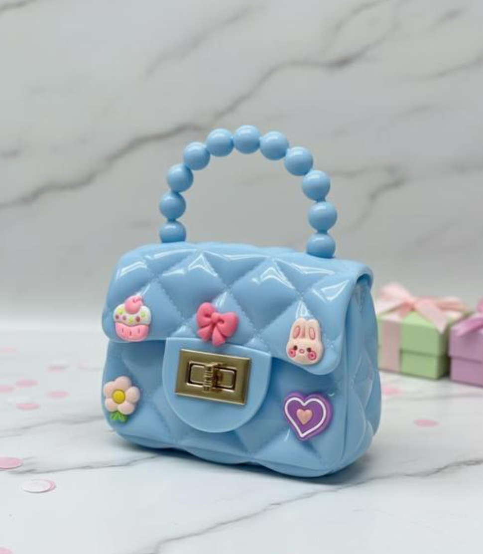 Mini Sling Bag with charms in Blue