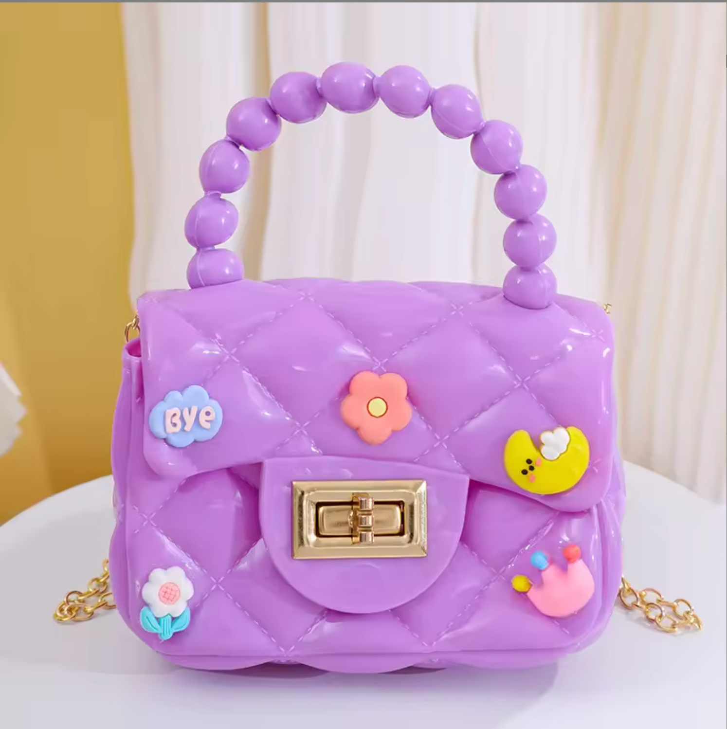 Mini Sling Bag with charms in Orchid