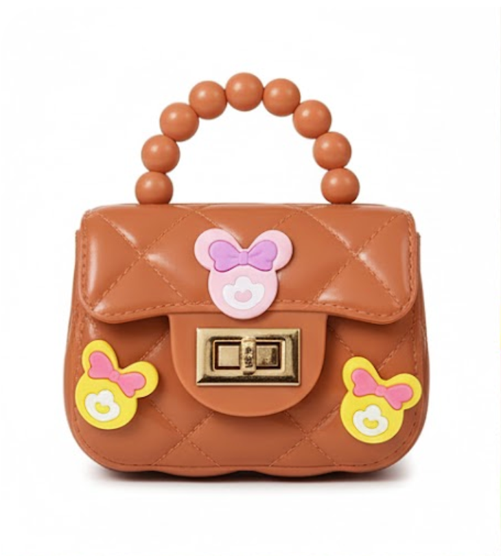 Mini Sling Bag with charms in Orangish Pink