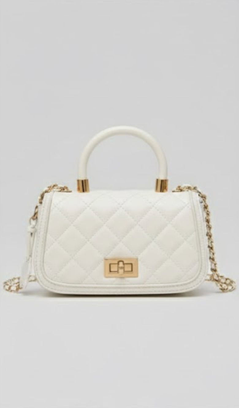 white quilted top-handle bag